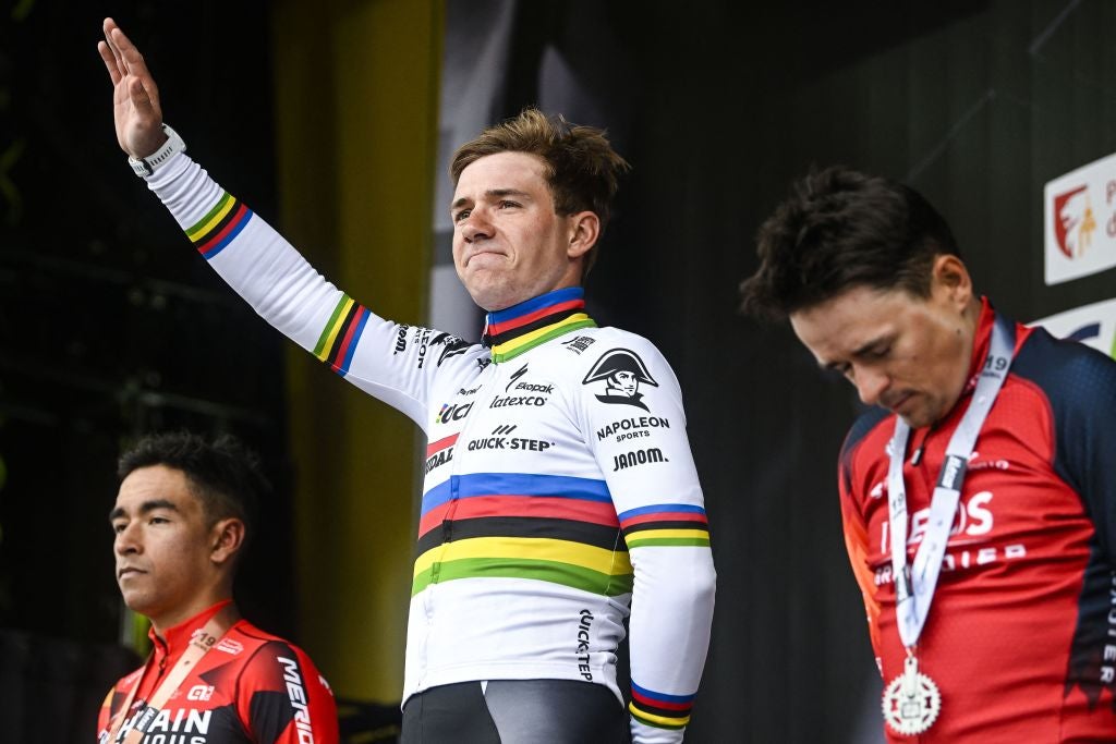 LtoR, Third placed Bahrain Victorious' Colombian Santiago Buitrago, winner Soudal Quick-Step's Belgian Remco Evenepoel and second placed Ineos Grenadiers' British Tom Pidcock celebrate on the podium after the men's elite race of the Liege-Bastogne-Liege one day cycling event, 258,5 km round-trip from Liege via Bastogne, on April 23, 2023. (Photo by Tom Goyvaerts / Belga / AFP) / Belgium OUT (Photo by TOM GOYVAERTS/Belga/AFP via Getty Images)