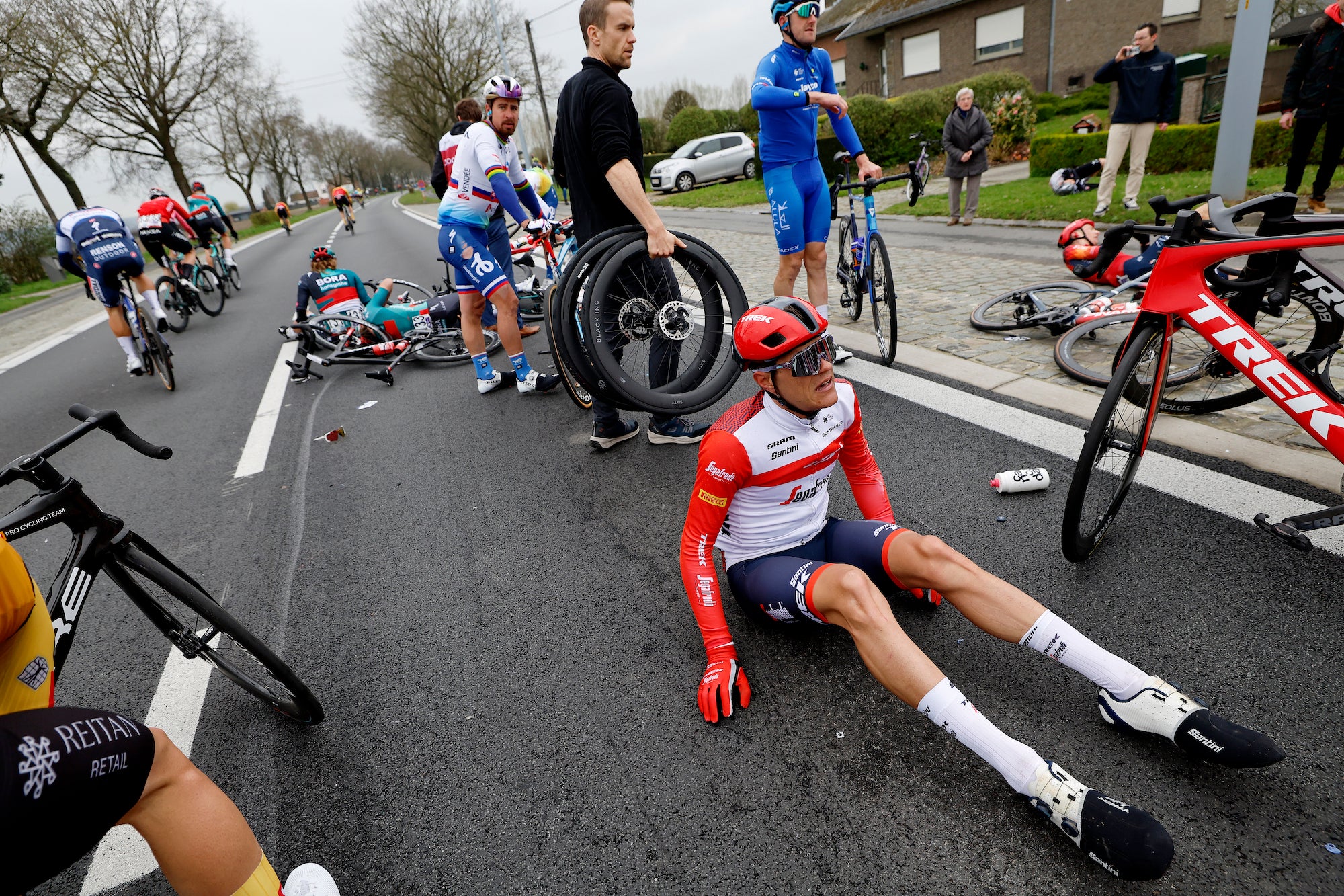 Jasper Stuyven was among the favorites who crashed heavily Sunday.