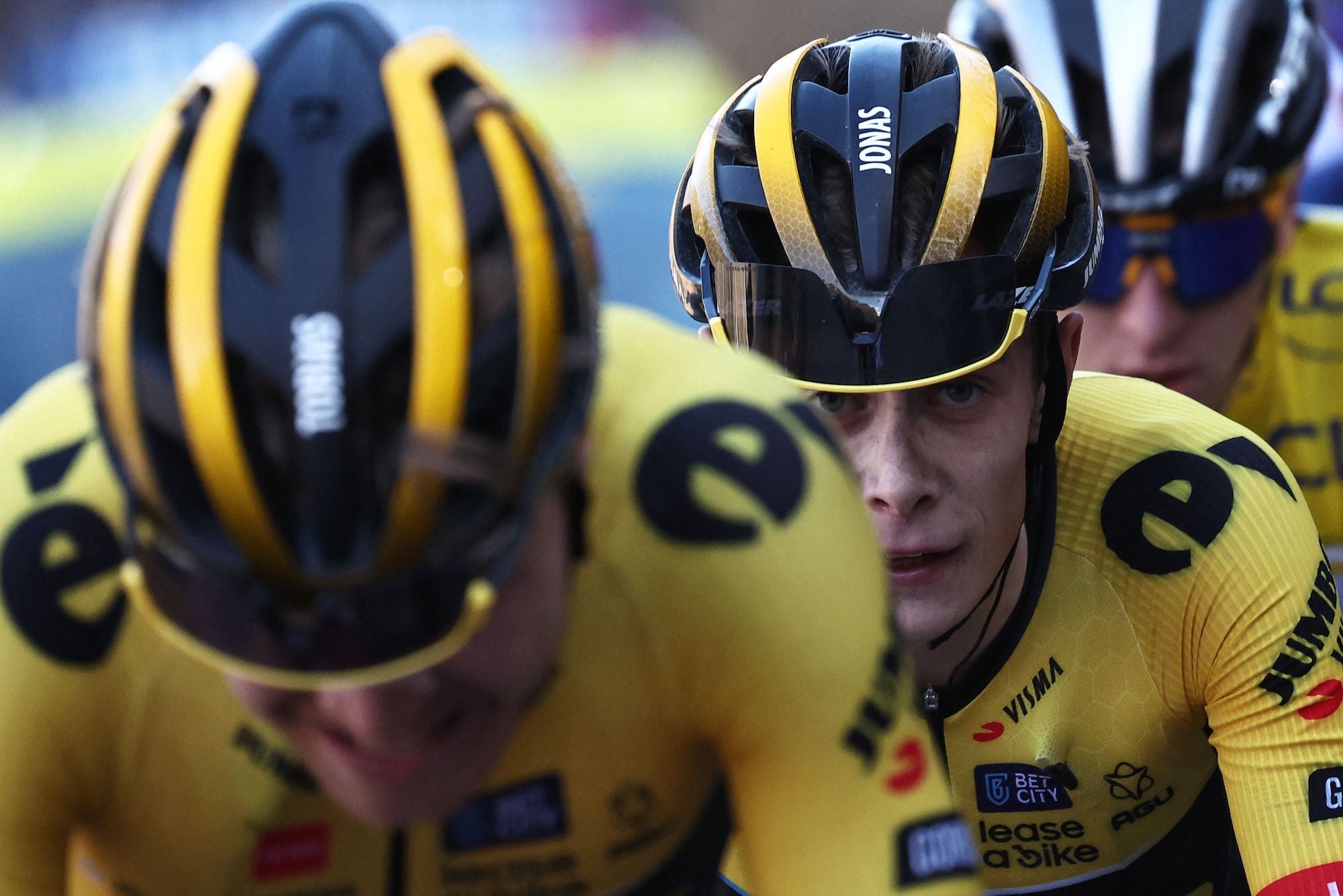Team Jumbo Visma's Norwegian rider Tobias Foss (L), Jumbo-Visma's Danish rider Jonas Vingegaard and UAE Team Emirates' Slovenian rider Tadej Pogacar wearing the overall leader's yellow jersey cycle in the final kilometers of the 7th stage of the 81st Paris - Nice cycling race, 143 km between Nice and Col de la Couillole, near Col de la Couillole, south-eastern France, on March 11, 2023. (Photo by Anne-Christine POUJOULAT / AFP) (Photo by ANNE-CHRISTINE POUJOULAT/AFP via Getty Images)