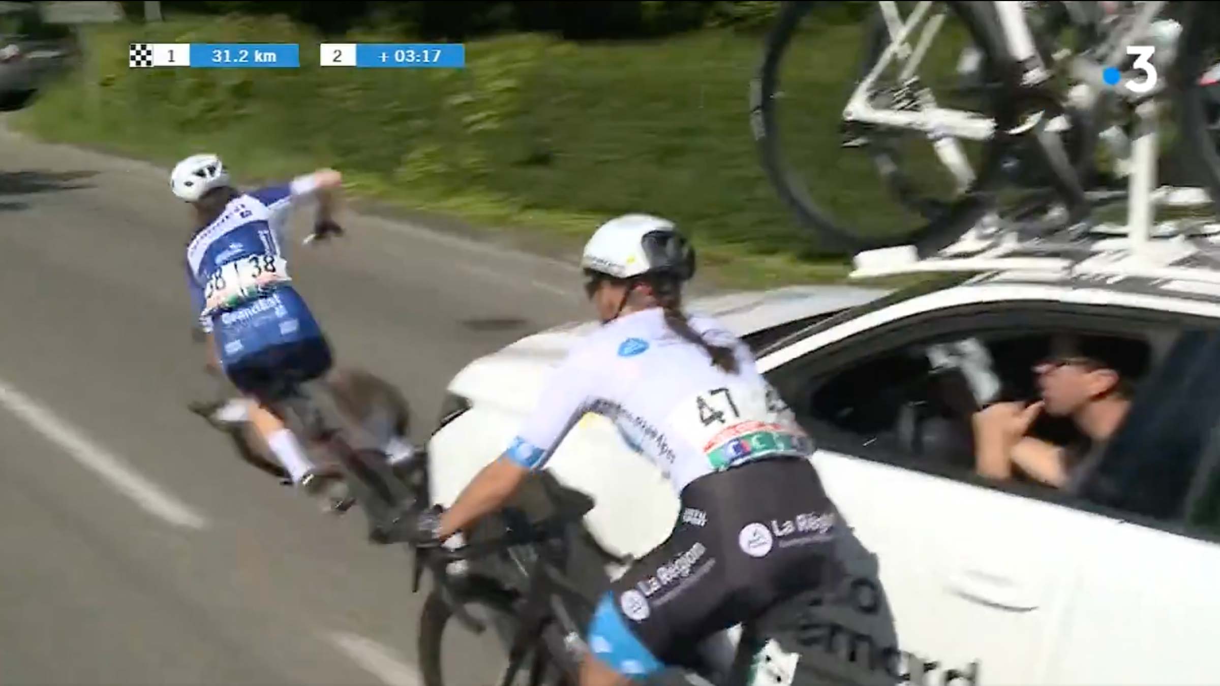 team car hits cyclist during french junior national championship.